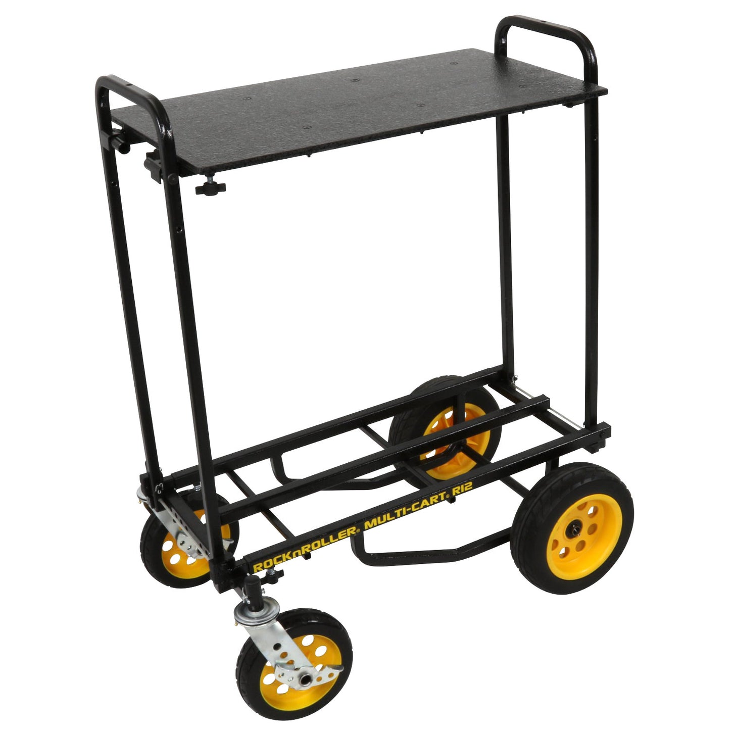 Black carpeted laptop/media shelf installed on a Rock N Roller R8/R10/R12 cart, showing two-tier setup with 32–50″ foldable platform supported by steel poles and mounted between upright handles