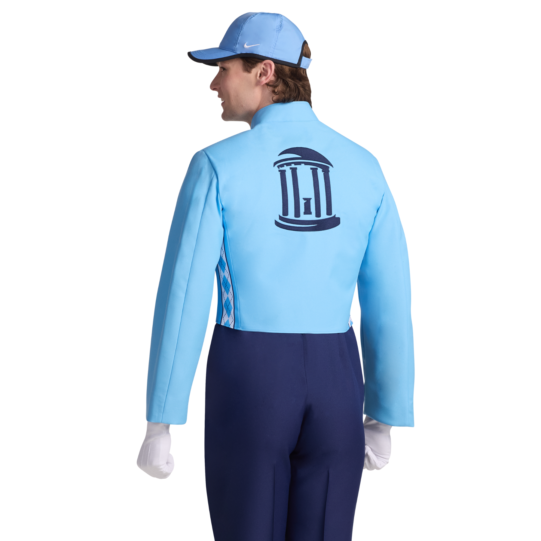 Person wearing a light blue jacket with a logo on the back, dark blue pants, and white gloves on a white background.