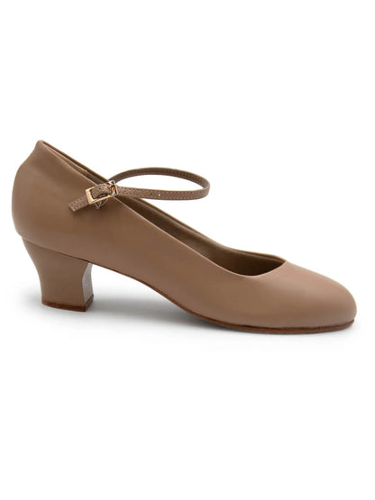 Side profile of Mia Jr 1.5″ caramel character shoe highlighting smooth upper, mid‑height sculpted heel, and clean leather sole.