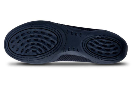 Bottom view of Renegade 1 marching shoe showing full rubber sole with segmented traction zones and flex grooves for superior grip and mobility on turf and gym floors