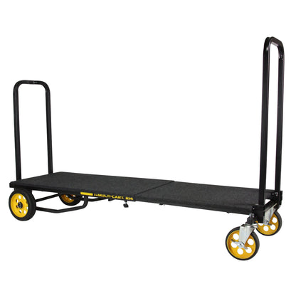Carpeted RockNRoller solid deck fully extended on a cart frame, showing support uprights and yellow-rimmed wheels—ideal for transporting AV gear and small items securely