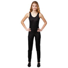 Vivace unisex black stretch unitard on female model, with slim-fitting silhouette, scoop neck, and ankle-length design for flexible performance wear.